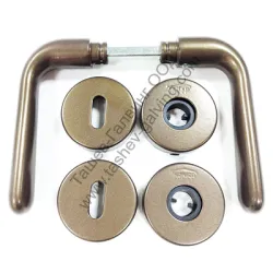 Дръжка Sonico реверсивна за обикновена брава с розетка антик Дръжка Sonico реверсивна за обикновена брава с розетка антик